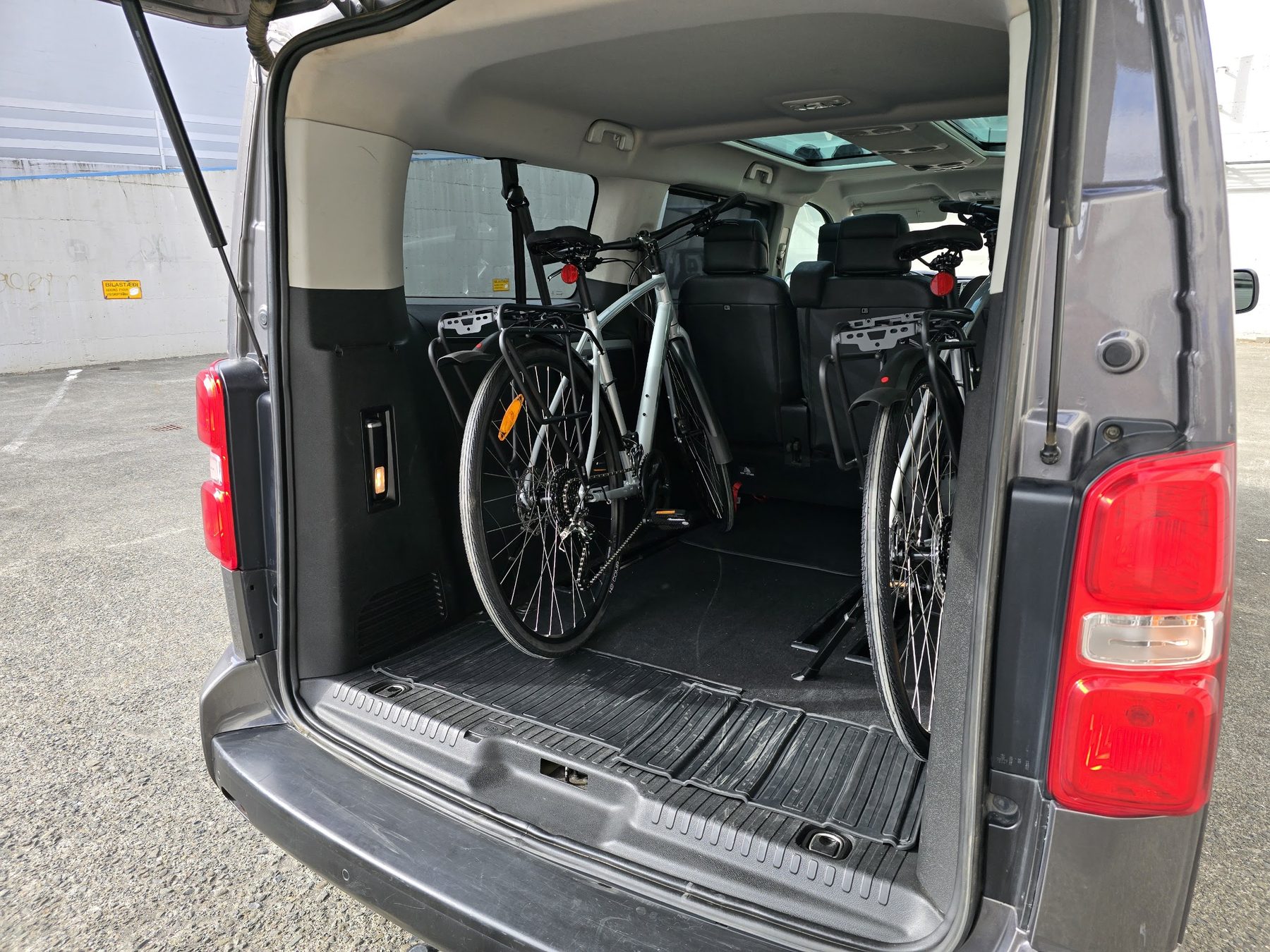 Bikes secured upright inside our Toyota van